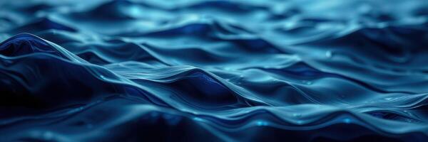 Rippling waves create mesmerizing patterns in deep blue water under soft light photo