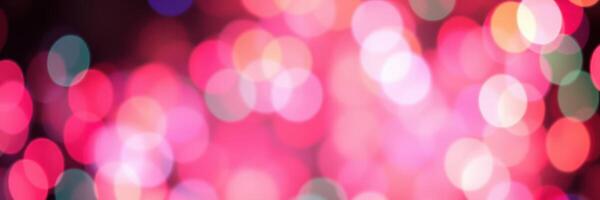 Bright abstract lights create a vibrant atmosphere with colorful bokeh effect in a festive setting photo
