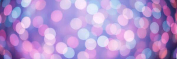 Soft, shimmering bokeh lights create a dreamy atmosphere in shades of pink and blue photo