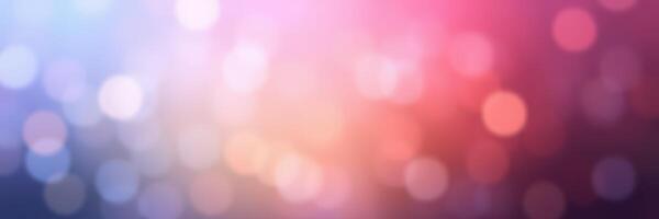 Colorful bokeh lights create an abstract background with soft hues of pink, blue, and purple during a vibrant event photo