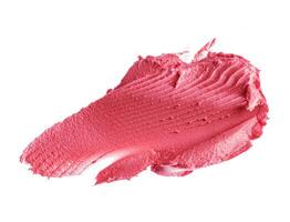 Stains of a pink lipstick isolated on white background photo