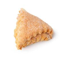 Delicious sweet pastry shaped like a triangle, popular in many cultures, enjoyed as a dessert or snack photo