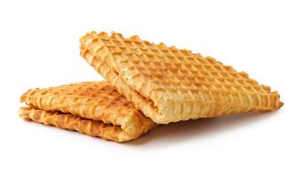 Crispy waffles stacked on a white background ready to be enjoyed for breakfast or dessert photo