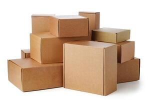 Stacked brown cardboard boxes in various sizes arranged on a white background photo