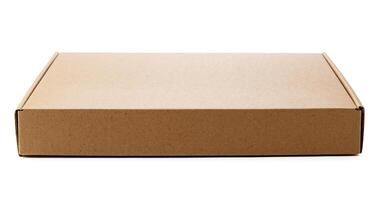 A plain cardboard box resting on a flat surface ready for shipping photo