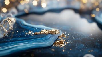 Elegant blue and gold abstract artwork with sparkling details and smooth textures photo
