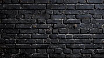 Textured black bricks create a rustic appearance in low light, showcasing the walls unique characteristics photo
