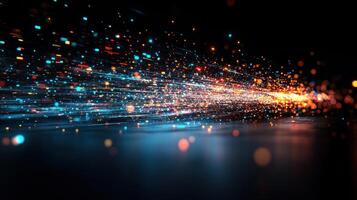 Colorful light streaks and particles create an energetic abstract design against a dark background photo