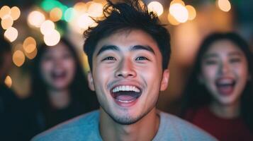 A man is laughing with his friends photo