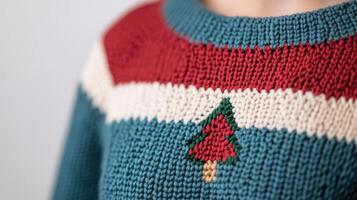 Handmade Crochet Patterns With Textured Knit Sweater Featuring Festive Christmas Tree Motif In Red, Green, And White Colors, Highlighting Intricate Craftsmanship And Holiday Design photo