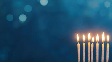 Hanukkah Candle Lights With Menorah Decoration and Blue Bokeh Background for Celebratory and Festive Judaic Holiday Season Design and Symbolic Traditions in Warm Seasonal Atmosphere photo
