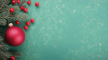 Festive Christmas Background with Red Bauble and Fir Branches on Green with Bokeh Holiday Scene in AR 169 Format for Seasonal Decoration and Holiday Greeting Card Design photo