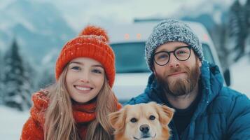 Happy Couple with Dog in Winter Snowy Mountain Landscape, Enjoying Outdoor Adventure, Travel by Van, Cozy Winter Clothing, Adventure Lifestyle, Snow-Covered Trees, Warm Hats and Jackets photo