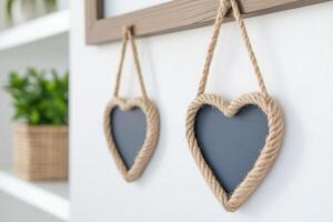 Photo frame of heart shape for mockup design on light wall background.