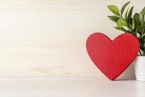 Photo frame of heart shape for mockup design on light table background.