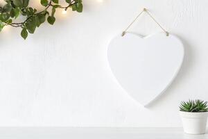 Photo frame of heart shape for mockup design on light wall background.