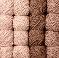 Mocha Mousse - color of the year 2025. colorful yarn wool on shopfront photo