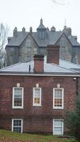 An old house built with the concrete located in the Dolystown of the USA photo