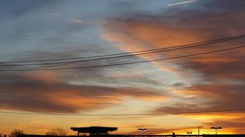 The beautiful sunset sky view with the colorful clouds as background photo