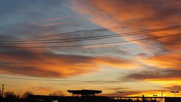 The beautiful sunset sky view with the colorful clouds as background photo