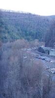 One old railway iron track across in the valley among the mountains photo