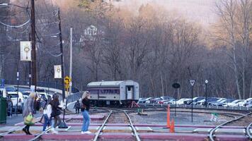 The railway station view with the wagons stopping on the iron tracks photo