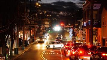 The town view with the lights on at night photo