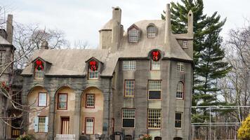 An old house built with the concrete located in the Dolystown of the USA photo
