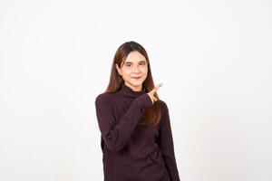 Smiling and Pointing side copy space showing advertising Of Beautiful Asian Woman Isolated On White Background photo