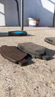 Checking Car Brake Pads on a Concrete Surface in a Detailed Closeup Composition and Design photo
