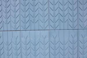 This is a Textured Blue Surface featuring an Arrow Pattern Design that captivates attention photo