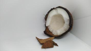Fresh Coconut with Shavings Set Against a Clean White Background for a Vibrant Look photo