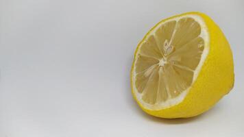 A Fresh Lemon Half Positioned on a Clean, Simple Background for Visual Appeal and Clarity photo