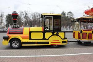 Enjoy a vibrant and colorful Mini Train specifically designed for children at the Amusement Park photo