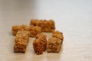Enjoy Delicious and Crunchy Snack Bars Displayed on a Rustic Wooden Background Surface photo
