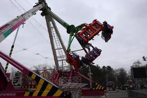 03.12.2024 Moldova Amazing and Thrilling Amusement Park Ride Captured in Exciting Action and Adventure photo