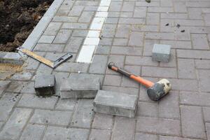 Essential Tools and Materials Required for the Installation of Paving Stones and Paths photo
