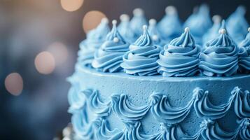 A close up view of a blue cake adorned with creamy frosting highlighting photo