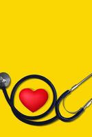 Stethoscope and heart symbol with inscription photo