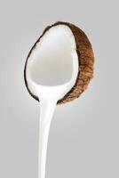 Coconuts water splash top view isolated on the white background photo