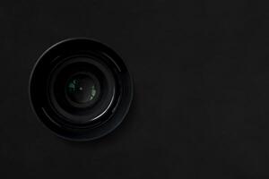 Camera lens in isolated on black background. copy space photo