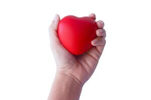 Red heart in man hands, isolated on white background - Clipping path photo