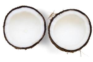 Coconuts fresh whole and half coconut and slices isolated on white background, top view - Clipping path photo
