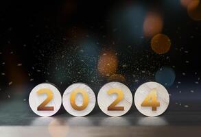 Wood on the table the back has bokeh. 2024 year number,start happy new year concept photo