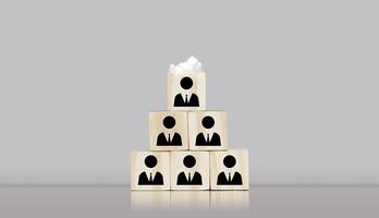 a stack of wooden cubes with people on them photo