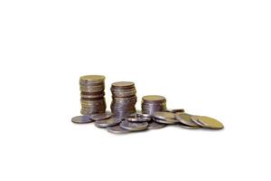 a pile of coins on a white background photo