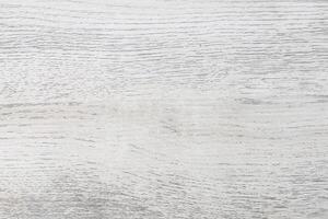 a close up of a wooden surface with white paint photo