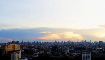 Cloudy sky and city background photo