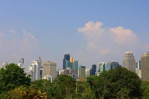 a city skyline with tall buildings photo