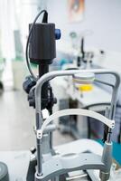 Microscopic apparatus for testing eyesight. Ophthalmology and treatment of eye diseases. Eye clinic, optometrist concept photo